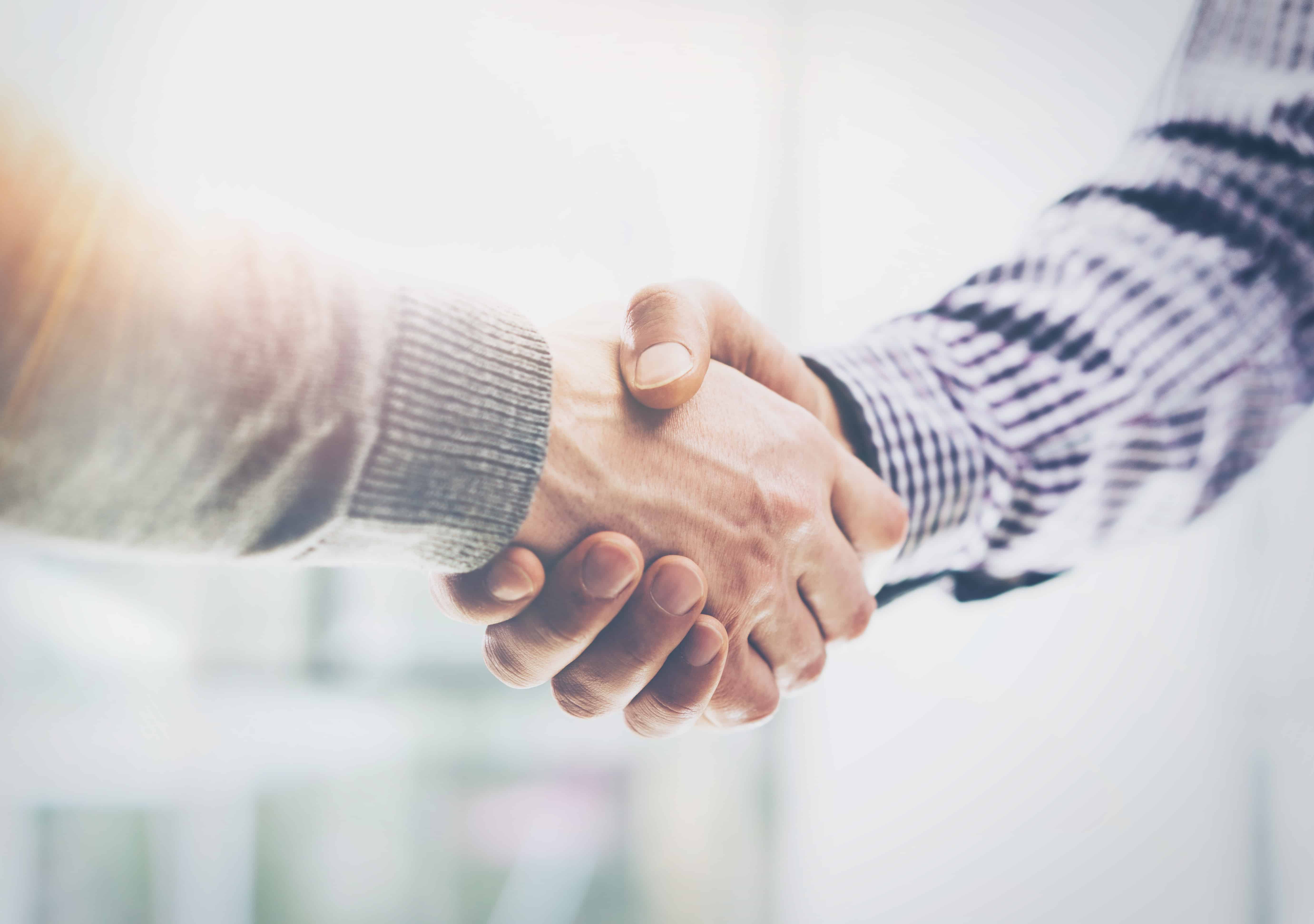 Business Partnership Meeting.Photo Two Businessmans Hands Handshake